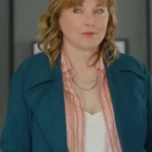 Alexa Crowe wearing a teal trench coat in My Life Is Murder Season 5; features a classic double-breasted design, waist belt, and rich teal color, blending detective style with modern elegance.