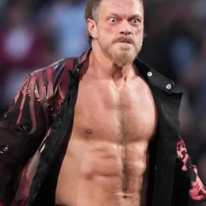 Edge wearing a long black leather coat on WWE SmackDown; features a dramatic, floor-length design with studded detailing, sharp shoulders, and a high-impact, theatrical look iconic to his wrestling persona.