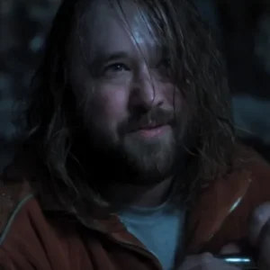 Haley Joel Osment wearing a track jacket in Wednesday Season 2